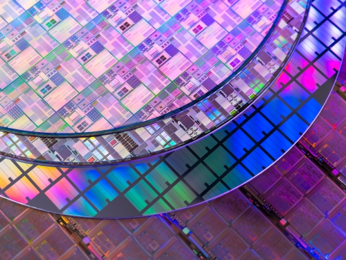 Silicon Wafer with microchips used in electronics for the fabrication of integrated circuits.