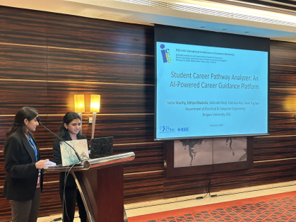 Two students presenting a paper at ICCE2026