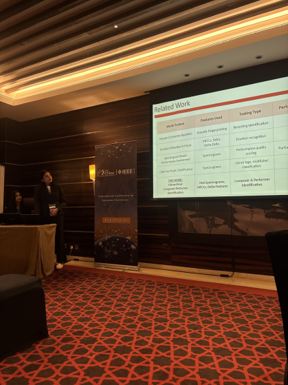 Two Rutgers student presenting their presentation slides at the ICCE2026